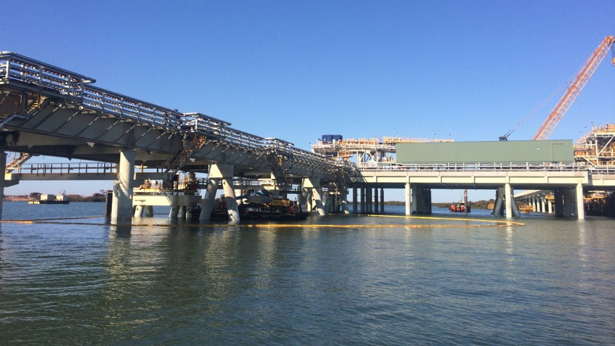 350 metre marine containment boom deployed during bridge construction project.