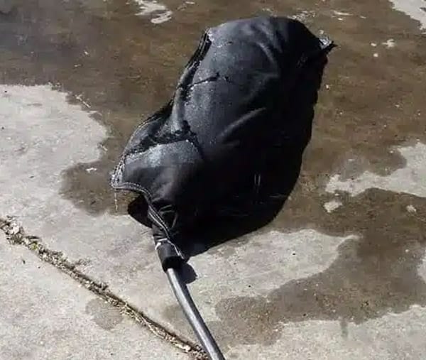 Dewatering bag in use during site dewatering operation