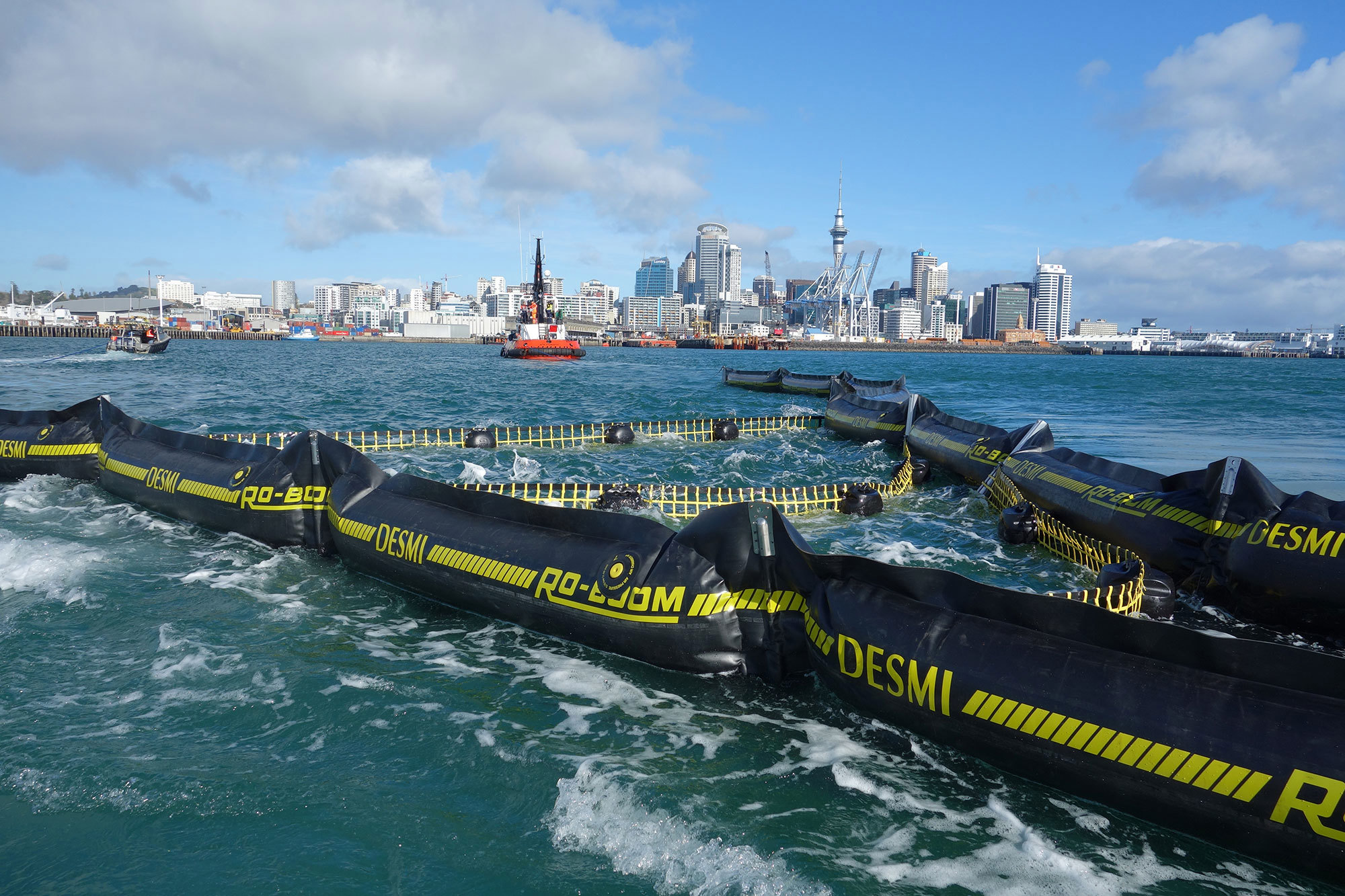 Port and harbour oil containment boom deployment Port and harbour oil containment boom deployment